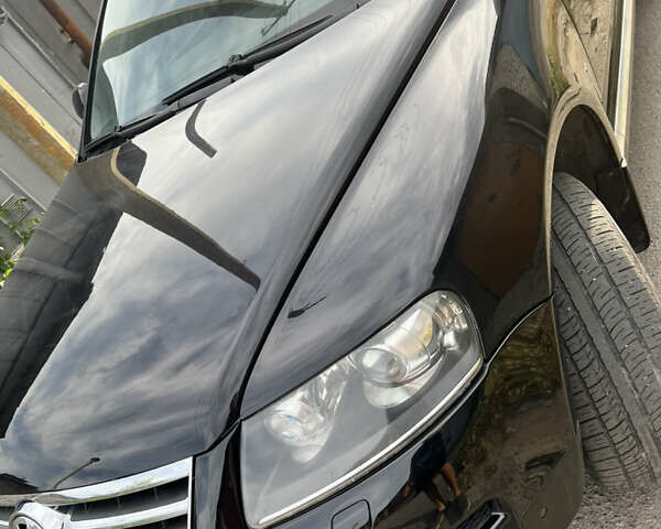 Чорний Фольксваген Туарег, об'ємом двигуна 3 л та пробігом 230 тис. км за 14000 $, фото 13 на Automoto.ua