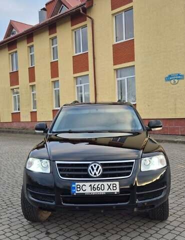 Черный Фольксваген Туарег, объемом двигателя 2.97 л и пробегом 343 тыс. км за 10000 $, фото 2 на Automoto.ua