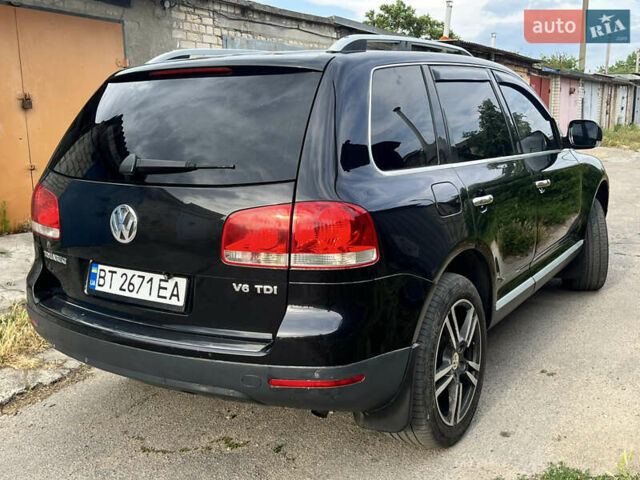 Чорний Фольксваген Туарег, об'ємом двигуна 3 л та пробігом 230 тис. км за 14000 $, фото 7 на Automoto.ua