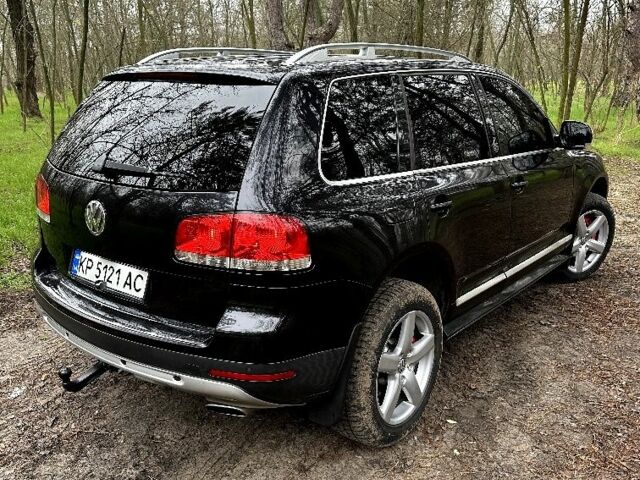 Черный Фольксваген Туарег, объемом двигателя 3 л и пробегом 337 тыс. км за 11000 $, фото 4 на Automoto.ua