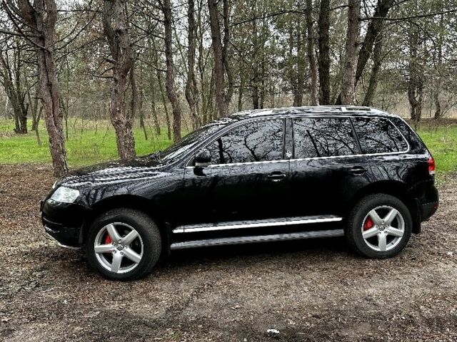 Черный Фольксваген Туарег, объемом двигателя 3 л и пробегом 337 тыс. км за 11000 $, фото 3 на Automoto.ua