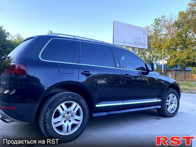 Черный Фольксваген Туарег, объемом двигателя 3 л и пробегом 340 тыс. км за 10800 $, фото 4 на Automoto.ua