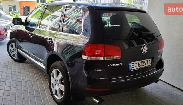 Чорний Фольксваген Туарег, об'ємом двигуна 3 л та пробігом 365 тис. км за 10700 $, фото 8 на Automoto.ua
