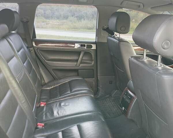 Черный Фольксваген Туарег, объемом двигателя 3 л и пробегом 292 тыс. км за 11500 $, фото 2 на Automoto.ua