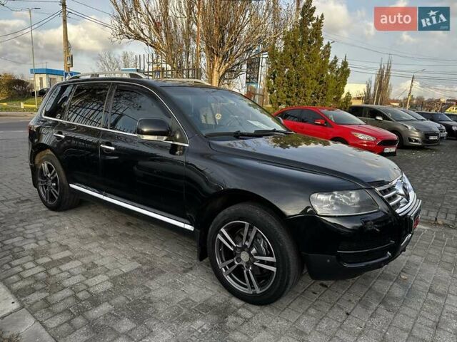 Черный Фольксваген Туарег, объемом двигателя 3 л и пробегом 250 тыс. км за 9700 $, фото 1 на Automoto.ua