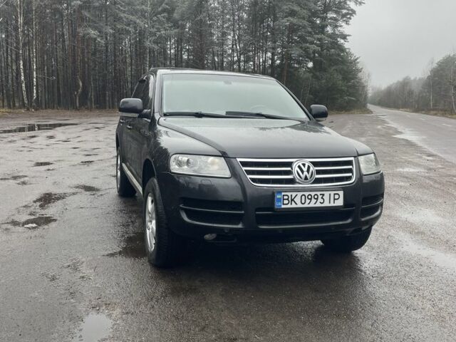Чорний Фольксваген Туарег, об'ємом двигуна 2.5 л та пробігом 351 тис. км за 10000 $, фото 1 на Automoto.ua