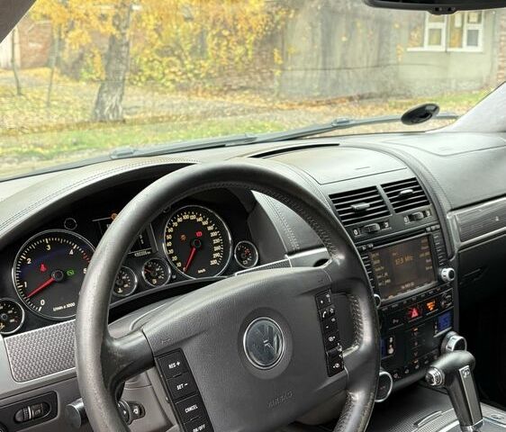 Чорний Фольксваген Туарег, об'ємом двигуна 5 л та пробігом 300 тис. км за 4700 $, фото 10 на Automoto.ua