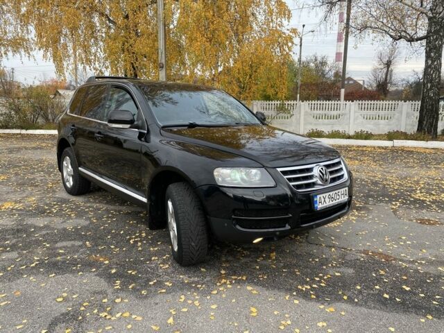Чорний Фольксваген Туарег, об'ємом двигуна 3 л та пробігом 300 тис. км за 8500 $, фото 1 на Automoto.ua