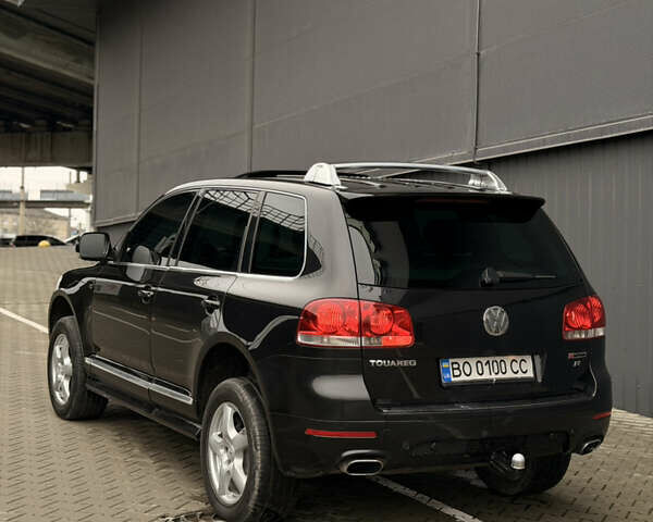 Черный Фольксваген Туарег, объемом двигателя 4.9 л и пробегом 340 тыс. км за 6900 $, фото 97 на Automoto.ua