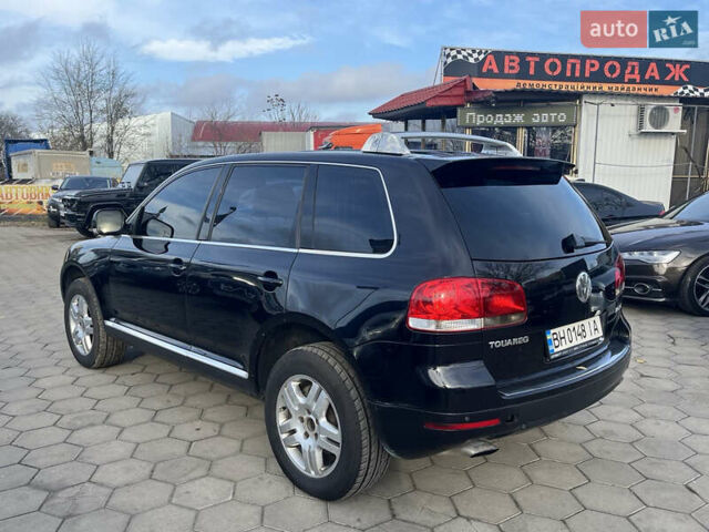 Черный Фольксваген Туарег, объемом двигателя 4.92 л и пробегом 350 тыс. км за 6500 $, фото 4 на Automoto.ua