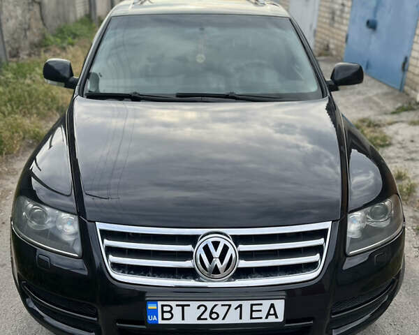 Чорний Фольксваген Туарег, об'ємом двигуна 3 л та пробігом 230 тис. км за 14000 $, фото 2 на Automoto.ua