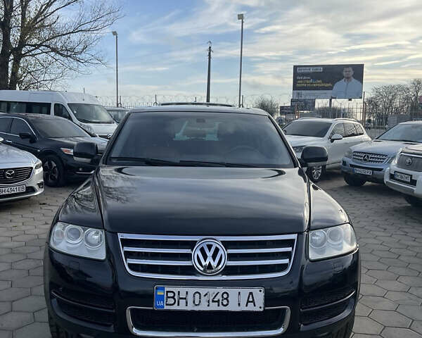 Черный Фольксваген Туарег, объемом двигателя 4.92 л и пробегом 350 тыс. км за 6500 $, фото 1 на Automoto.ua