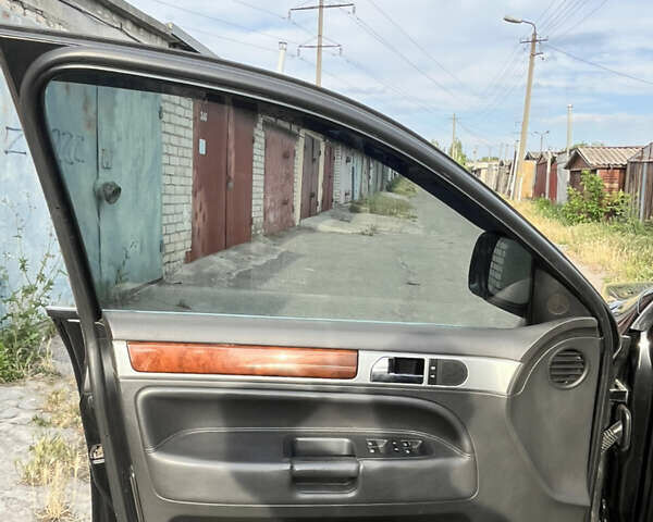 Чорний Фольксваген Туарег, об'ємом двигуна 3 л та пробігом 230 тис. км за 14000 $, фото 24 на Automoto.ua