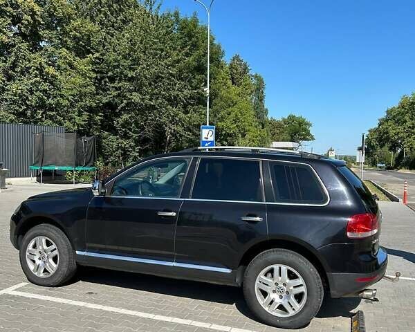 Чорний Фольксваген Туарег, об'ємом двигуна 3 л та пробігом 247 тис. км за 10200 $, фото 9 на Automoto.ua