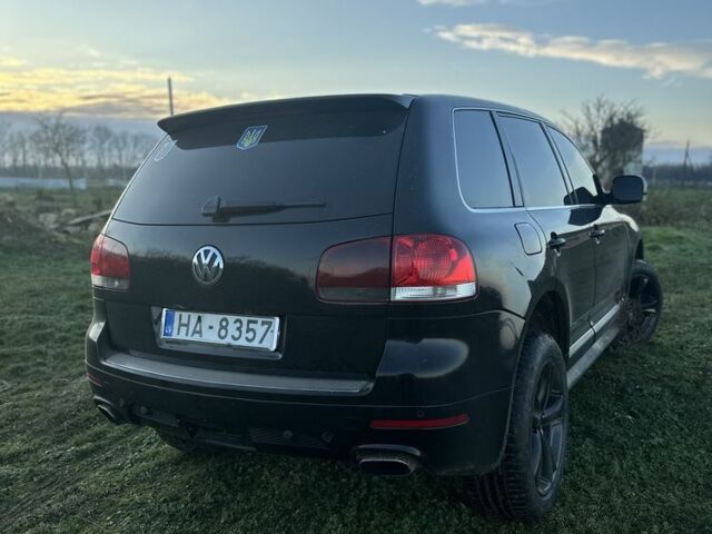 Черный Фольксваген Туарег, объемом двигателя 3 л и пробегом 446 тыс. км за 5650 $, фото 2 на Automoto.ua