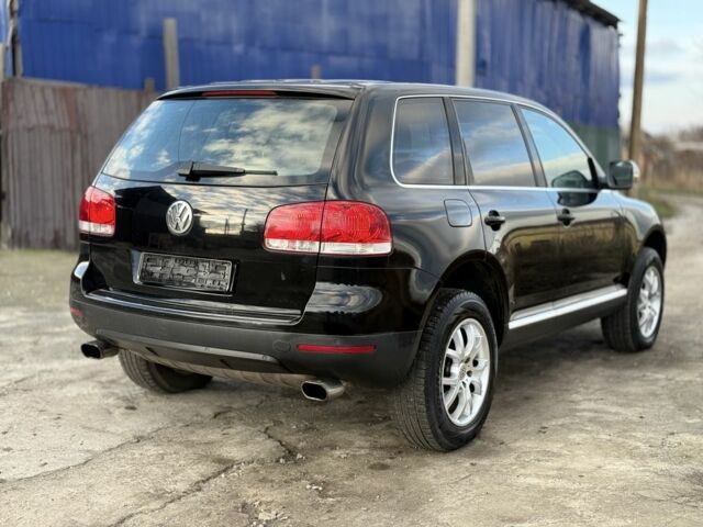 Черный Фольксваген Туарег, объемом двигателя 2.5 л и пробегом 232 тыс. км за 5750 $, фото 6 на Automoto.ua