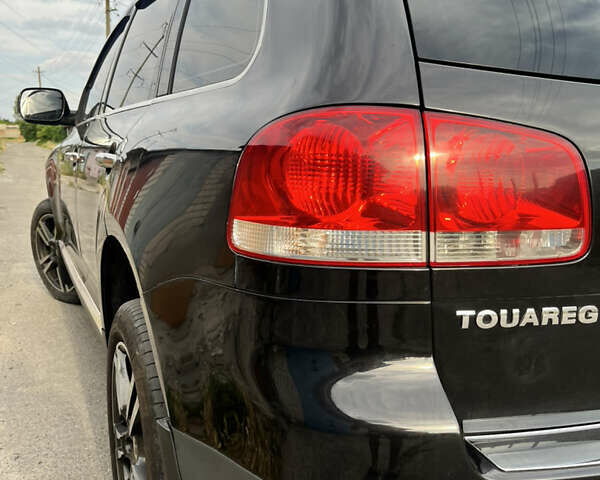 Чорний Фольксваген Туарег, об'ємом двигуна 3 л та пробігом 230 тис. км за 14000 $, фото 9 на Automoto.ua