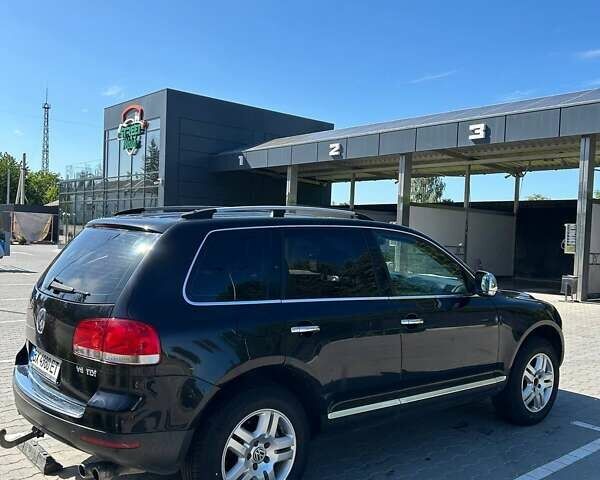 Чорний Фольксваген Туарег, об'ємом двигуна 3 л та пробігом 247 тис. км за 10200 $, фото 8 на Automoto.ua