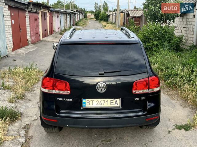Чорний Фольксваген Туарег, об'ємом двигуна 3 л та пробігом 230 тис. км за 14000 $, фото 5 на Automoto.ua