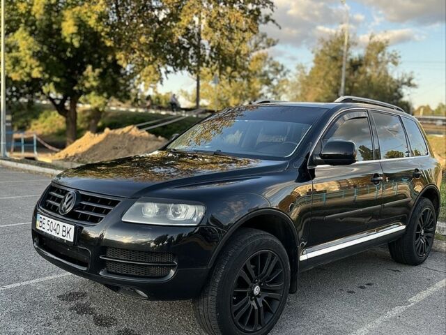 Черный Фольксваген Туарег, объемом двигателя 2.5 л и пробегом 253 тыс. км за 9100 $, фото 1 на Automoto.ua