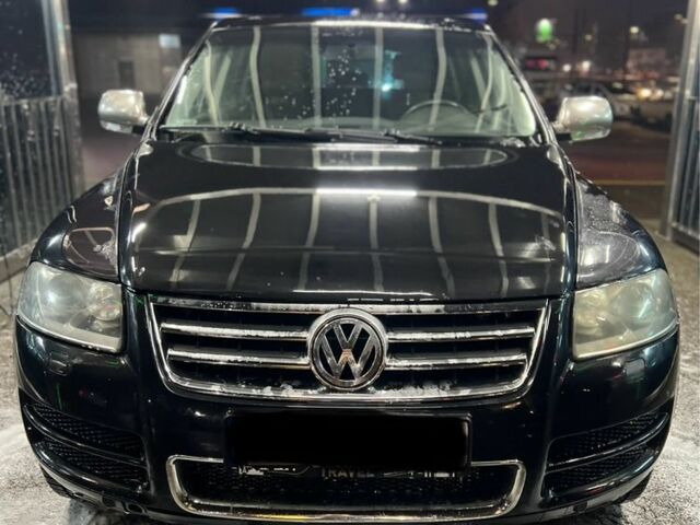 Чорний Фольксваген Туарег, об'ємом двигуна 3 л та пробігом 450 тис. км за 4950 $, фото 3 на Automoto.ua