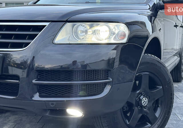 Чорний Фольксваген Туарег, об'ємом двигуна 2.5 л та пробігом 176 тис. км за 9950 $, фото 60 на Automoto.ua