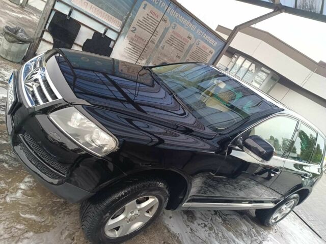 Чорний Фольксваген Туарег, об'ємом двигуна 3 л та пробігом 285 тис. км за 8500 $, фото 1 на Automoto.ua