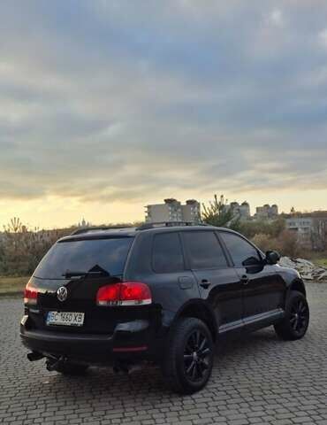 Черный Фольксваген Туарег, объемом двигателя 2.97 л и пробегом 343 тыс. км за 10000 $, фото 5 на Automoto.ua
