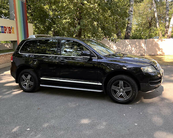 Чорний Фольксваген Туарег, об'ємом двигуна 3 л та пробігом 280 тис. км за 11000 $, фото 9 на Automoto.ua