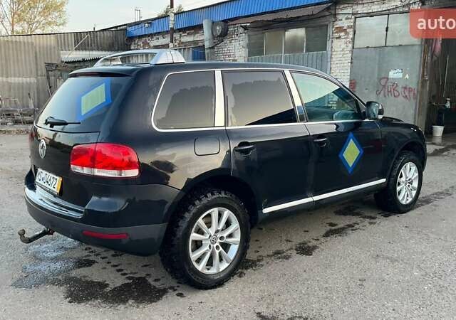 Черный Фольксваген Туарег, объемом двигателя 3 л и пробегом 260 тыс. км за 6000 $, фото 2 на Automoto.ua