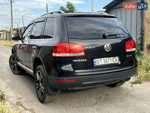 Чорний Фольксваген Туарег, об'ємом двигуна 3 л та пробігом 230 тис. км за 14000 $, фото 6 на Automoto.ua