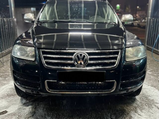 Чорний Фольксваген Туарег, об'ємом двигуна 3 л та пробігом 450 тис. км за 4950 $, фото 2 на Automoto.ua