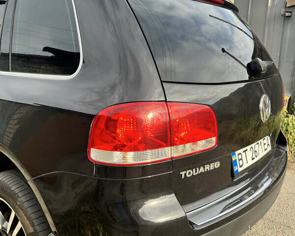 Чорний Фольксваген Туарег, об'ємом двигуна 3 л та пробігом 230 тис. км за 14000 $, фото 18 на Automoto.ua