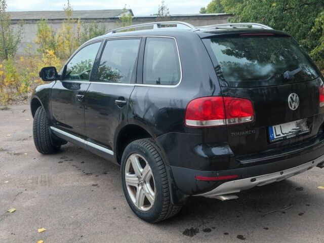 Черный Фольксваген Туарег, объемом двигателя 5 л и пробегом 207 тыс. км за 5500 $, фото 3 на Automoto.ua