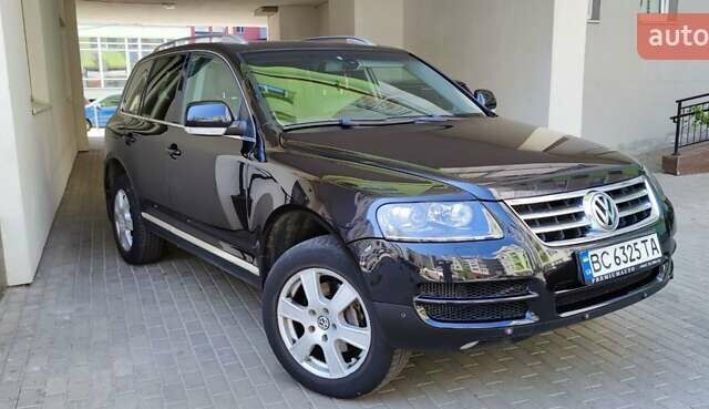 Чорний Фольксваген Туарег, об'ємом двигуна 3 л та пробігом 365 тис. км за 10700 $, фото 1 на Automoto.ua
