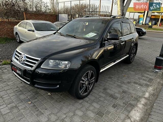Черный Фольксваген Туарег, объемом двигателя 3 л и пробегом 250 тыс. км за 9700 $, фото 2 на Automoto.ua