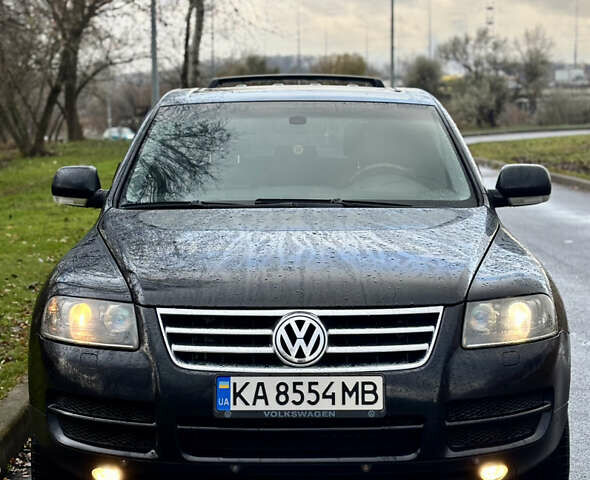 Чорний Фольксваген Туарег, об'ємом двигуна 3.2 л та пробігом 250 тис. км за 7500 $, фото 1 на Automoto.ua