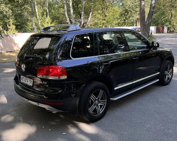 Чорний Фольксваген Туарег, об'ємом двигуна 3 л та пробігом 280 тис. км за 11000 $, фото 7 на Automoto.ua