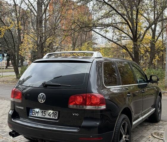 Чорний Фольксваген Туарег, об'ємом двигуна 5 л та пробігом 300 тис. км за 4700 $, фото 3 на Automoto.ua