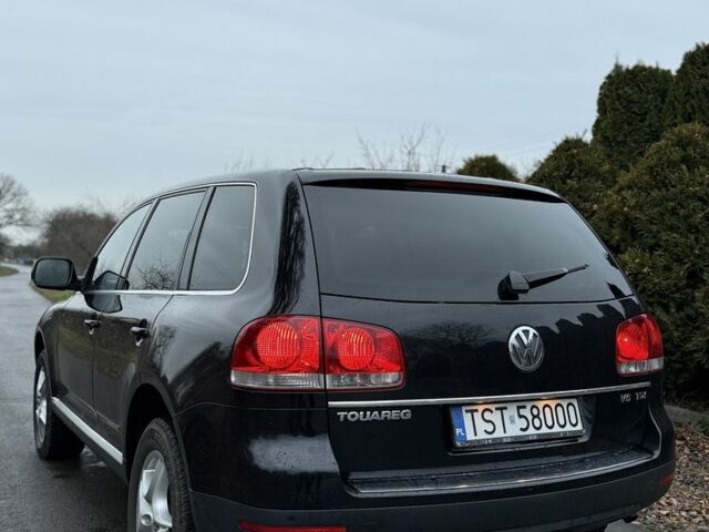 Черный Фольксваген Туарег, объемом двигателя 3 л и пробегом 232 тыс. км за 6200 $, фото 7 на Automoto.ua