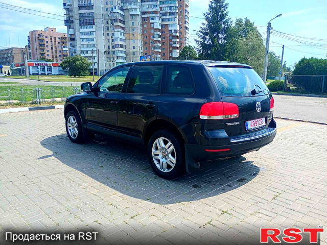 Черный Фольксваген Туарег, объемом двигателя 3.2 л и пробегом 318 тыс. км за 4950 $, фото 3 на Automoto.ua