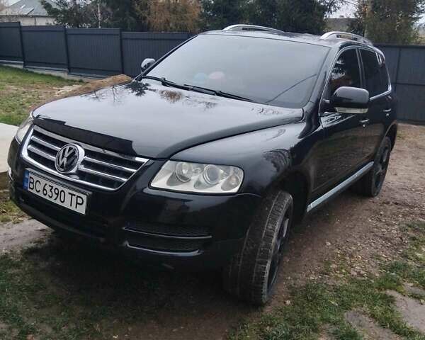 Чорний Фольксваген Туарег, об'ємом двигуна 3 л та пробігом 318 тис. км за 9200 $, фото 3 на Automoto.ua
