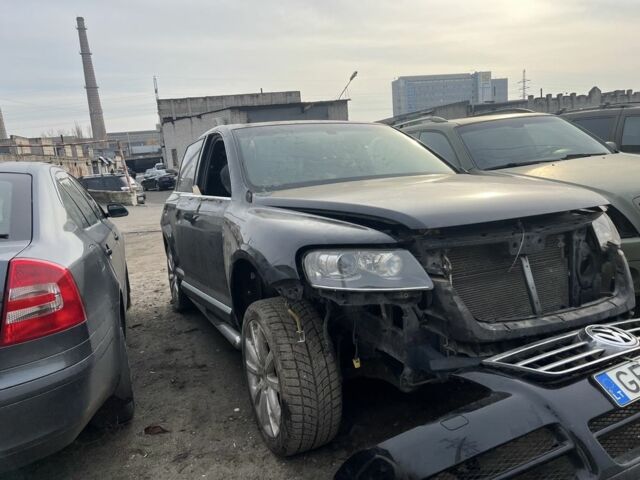 Чорний Фольксваген Туарег, об'ємом двигуна 3 л та пробігом 127 тис. км за 1599 $, фото 4 на Automoto.ua