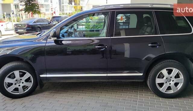Чорний Фольксваген Туарег, об'ємом двигуна 3 л та пробігом 365 тис. км за 10700 $, фото 4 на Automoto.ua