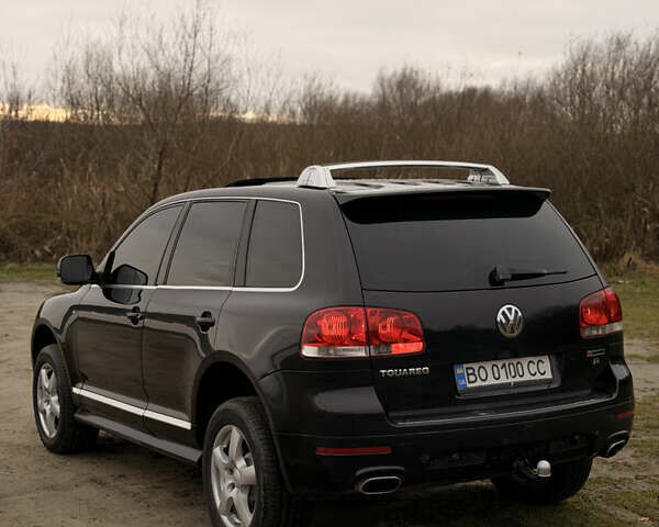 Черный Фольксваген Туарег, объемом двигателя 4.9 л и пробегом 340 тыс. км за 6900 $, фото 106 на Automoto.ua