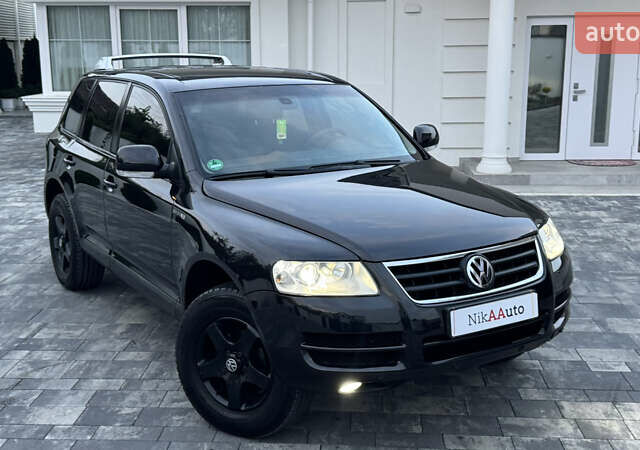 Чорний Фольксваген Туарег, об'ємом двигуна 2.5 л та пробігом 176 тис. км за 9950 $, фото 1 на Automoto.ua