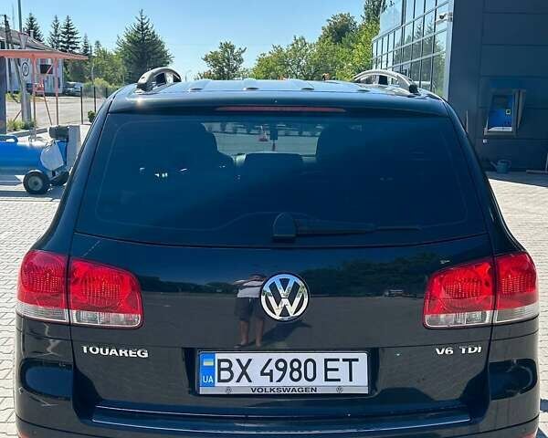 Чорний Фольксваген Туарег, об'ємом двигуна 3 л та пробігом 247 тис. км за 10200 $, фото 1 на Automoto.ua
