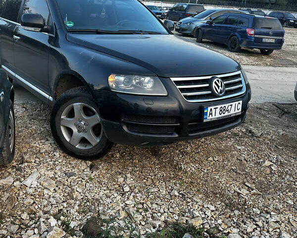 Черный Фольксваген Туарег, объемом двигателя 2.46 л и пробегом 325 тыс. км за 8700 $, фото 5 на Automoto.ua