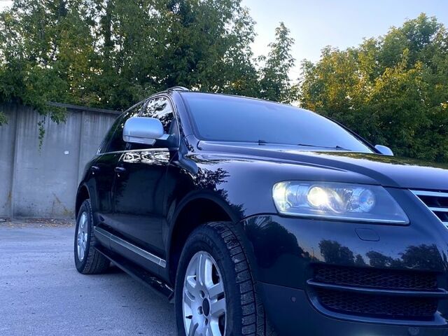 Черный Фольксваген Туарег, объемом двигателя 3 л и пробегом 340 тыс. км за 10800 $, фото 5 на Automoto.ua