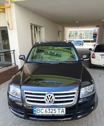 Чорний Фольксваген Туарег, об'ємом двигуна 3 л та пробігом 365 тис. км за 10700 $, фото 7 на Automoto.ua